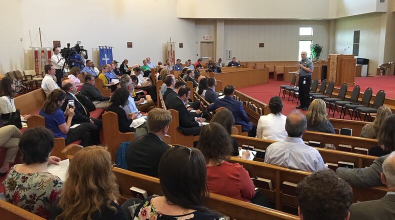 About 80 people gather Wednesday morning at St. Margaret’s Episcopal Church in Trotwood to plan long-term tornado recovery efforts. CHRIS STEWART / STAFF