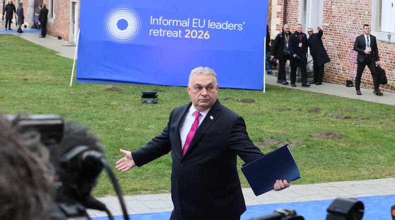 Hungary's Prime Minister Viktor Orban, center, arrives for the EU summit at Alden Biesen Castle in Bilzen-Hoeselt, Belgium, Thursday, Feb. 12, 2026. (AP Photo/Francois Walschaerts)