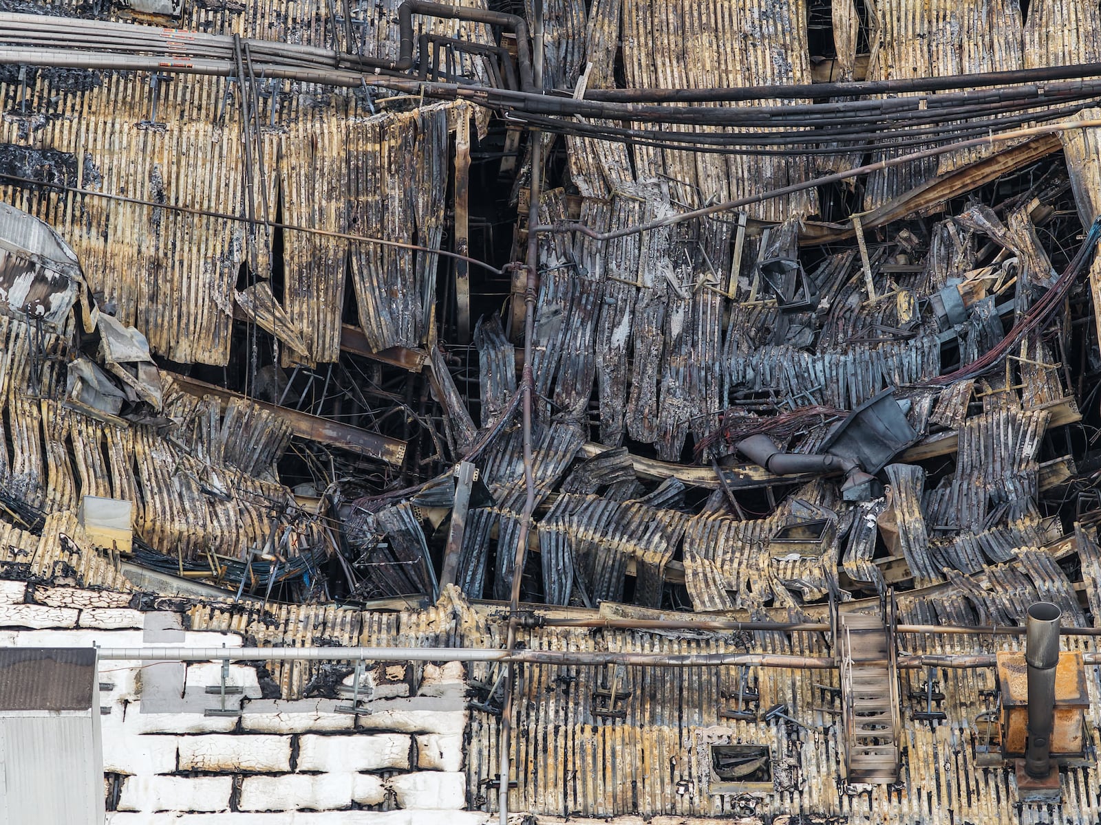 The aftermath of a fire that destroyed a portion of Koch Foods in Fairfield. The Butler County Coroner’s Office on Feb. 17 identified the man killed in the fire as 25-year-old Griffin Darrow. NICK GRAHAM/STAFF