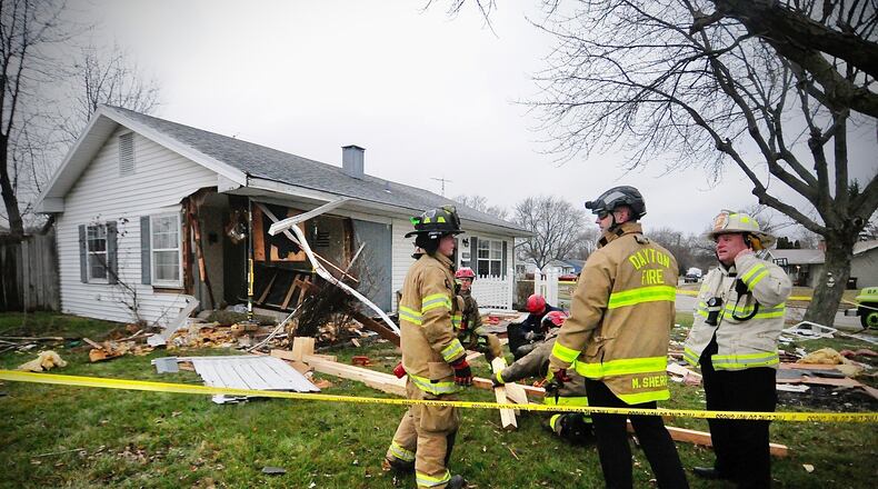 One person was injured after a vehicle crashed into a Foley Drive house in Vandalia Friday, Jan. 13, 2023. MARSHALL GORBY / STAFF
