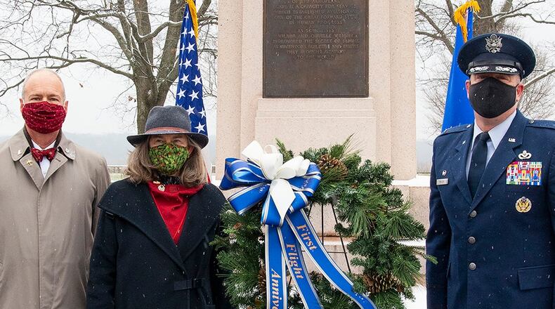 Amanda Wright Lane and Stephen Wright, great-grandniece and great-grandnephew of the Wright brothers, and Col. Patrick Miller, 88th Air Base Wing and installation commander, lay a wreath at the Wright Brothers Memorial on Dec. 17 during the 117th anniversary of the first flight. The memorial overlooks Huffman Prairie, where the Wright brothers taught themselves and others how to fly. U.S. AIR FORCE PHOTO/R.J. ORIEZ