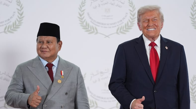 President Donald Trump greets Indonesia's President Prabowo Subianto during a summit to support ending the more than two-year Israel-Hamas war in Gaza after a breakthrough ceasefire deal, Monday, Oct. 13, 2025, in Sharm El Sheikh, Egypt. (AP Photo/Evan Vucci, Pool)
