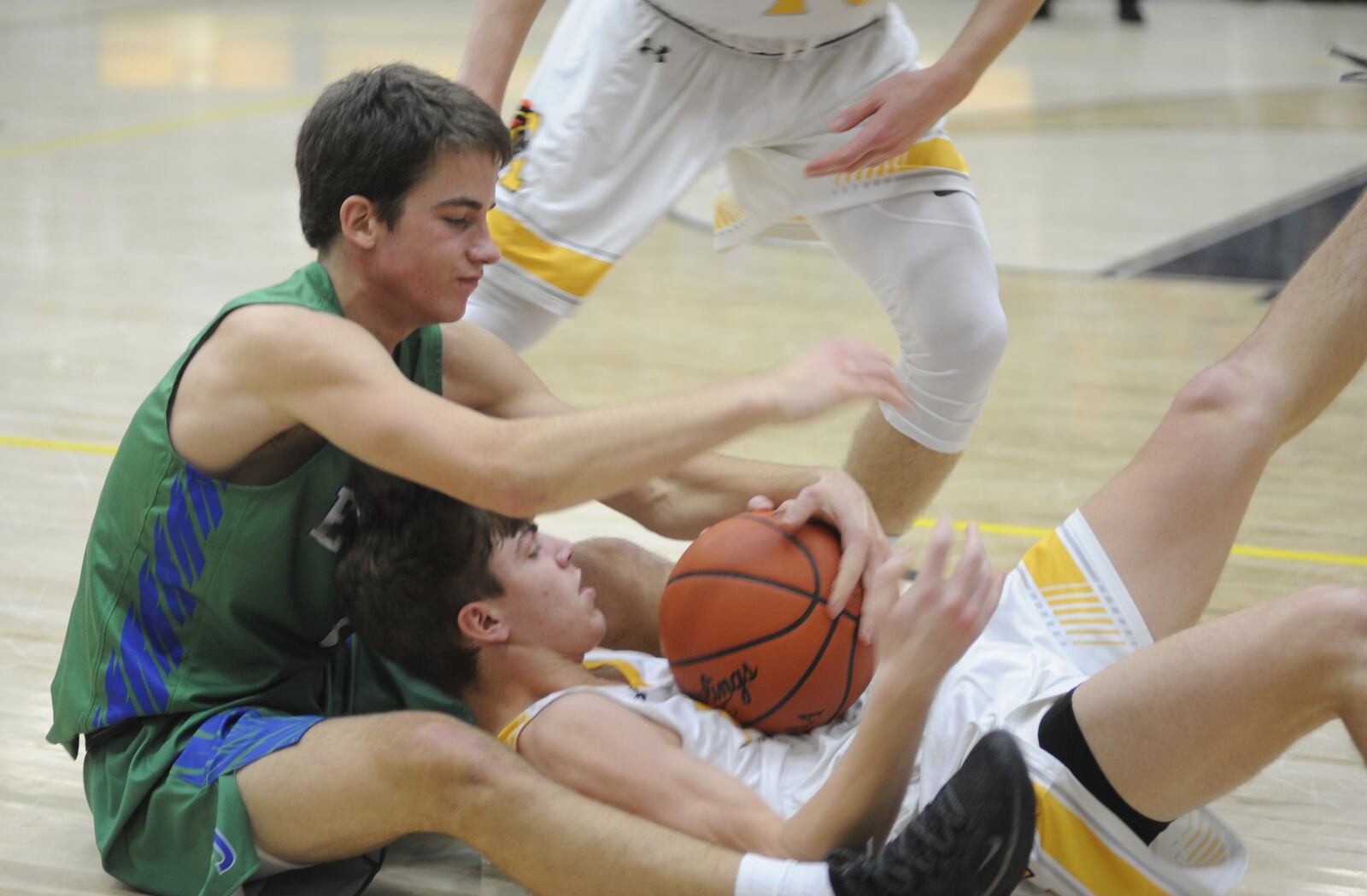 Sean Menker of CJ (left) contends with Rich Rolb of Alter for control. Chaminade Julienne defeat Alter 63-58 in a boys high school basketball game at Centerville on Sunday, Dec. 16, 2018. MARC PENDLETON / STAFF