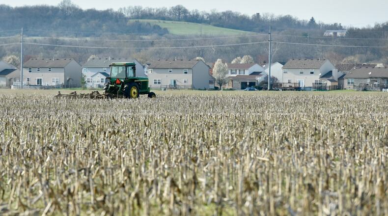 Some area farmers are concerned that they won’t be able to get all of their fields planted before the prime window closes because the soil is too moist amid a wet first few months of the year. STAFF PHOTO /NICK GRAHAM