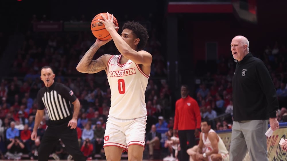 Dayton's Javon Bennett makes a 3-pointer against St. Bonaventure on Tuesday, Feb. 3, 2026, at UD Arena. David Jablonski/Staff
