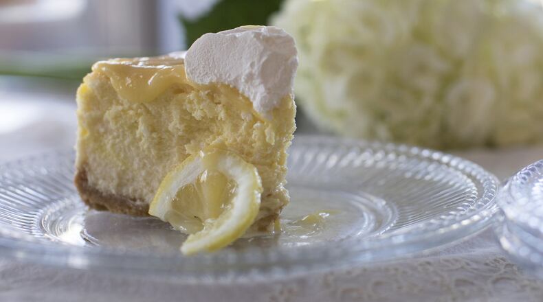 Dreamy Lemon Cheesecake has a crust made from sandwich cookies and a lemon curd topping. (Kathleen Galligan/Detroit Free Press/TNS)