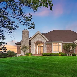 Built in 2004, this Beavercreek Township brick ranch has three, possibly four bedrooms and overlooks the 16th hole at Country Club of the North golf course. CONTRIBUTED