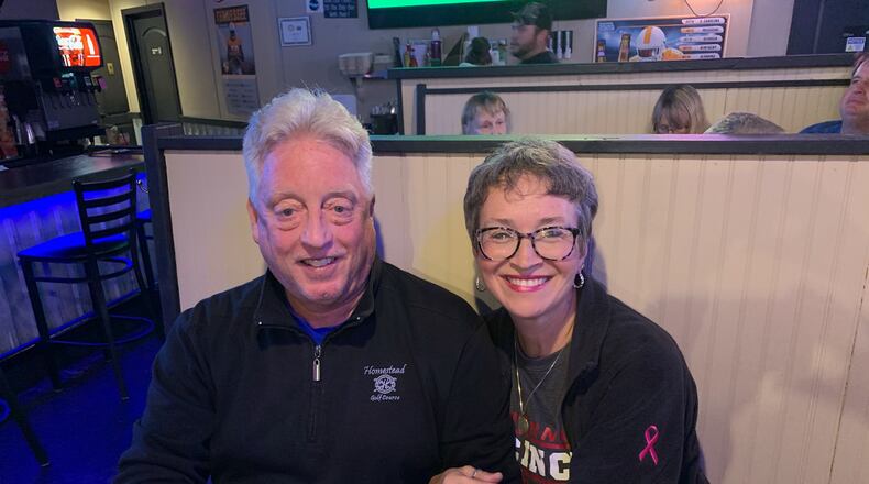 Ericha Schuster (right), pictured here with her husband Rob, volunteers with Grieving Children at Oak Tree Corner.