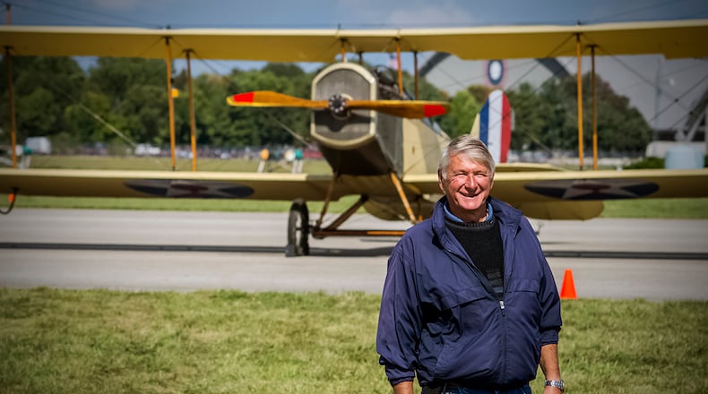 Dave Egner, director of special operations at Wright-Patterson Air Force Base, is retiring April 2 after more than 40 years of service. Here, he stands in front of a Stinson 108 during the 2018 World War I Dawn Patrol event at the National Museum of the U.S. Air Force, while he served as the air boss. CONTRIBUTED PHOTO/MIKE LENT, ALBA AUDIO VISUAL