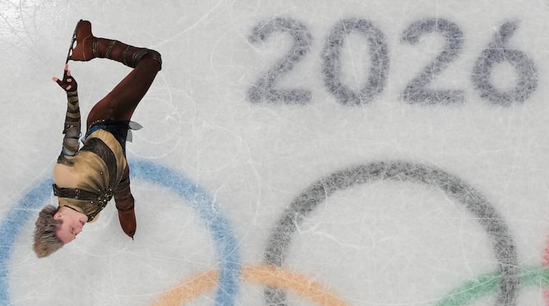 Ilia Malinin of the United States competes during the men's figure skating short program at the 2026 Winter Olympics, in Milan, Italy, Tuesday, Feb. 10, 2026. (AP Photo/Christophe Ena)