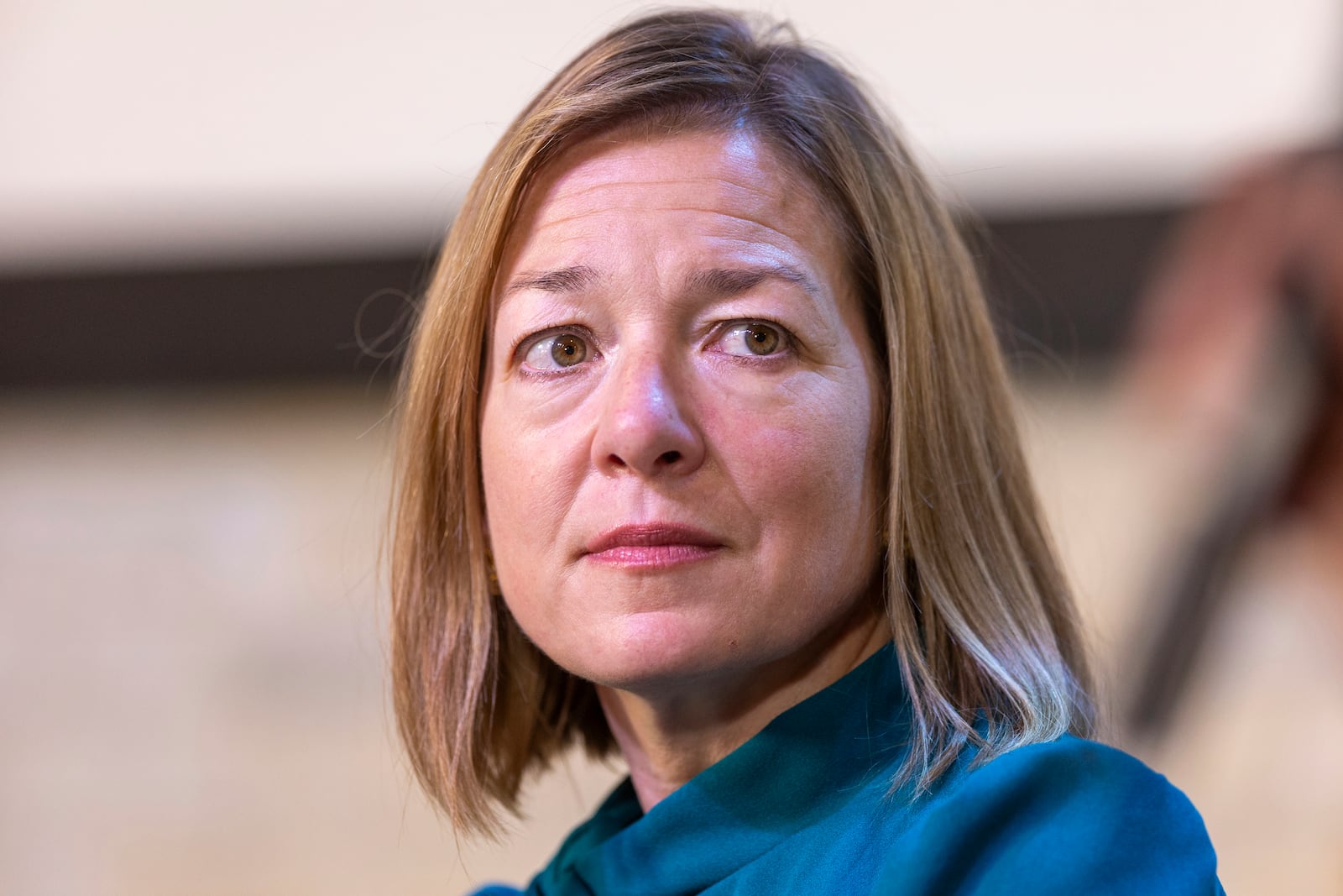 FILE - Lauren McLean, Mayor, City of Boise listens during a news conference at the Linen Building in Boise, Idaho, June 26, 2024. (AP Photo/Kyle Green, file)