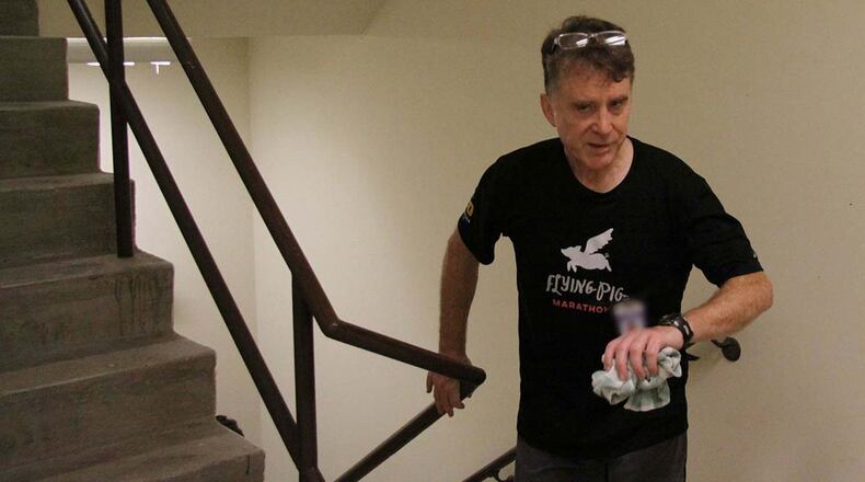 John Ebel, a technical advisor in the Radio Frequency Devices Branch, Sensors Directorate, Air Force Research Laboratory, participates in the Tower Climb Sept. 12 in honor of those who lost their lives in the 9/11 attacks and since then during the War on Terror. (U.S. Air Force photo/Ryan Gilbert/Badge blurred for security purposes.)