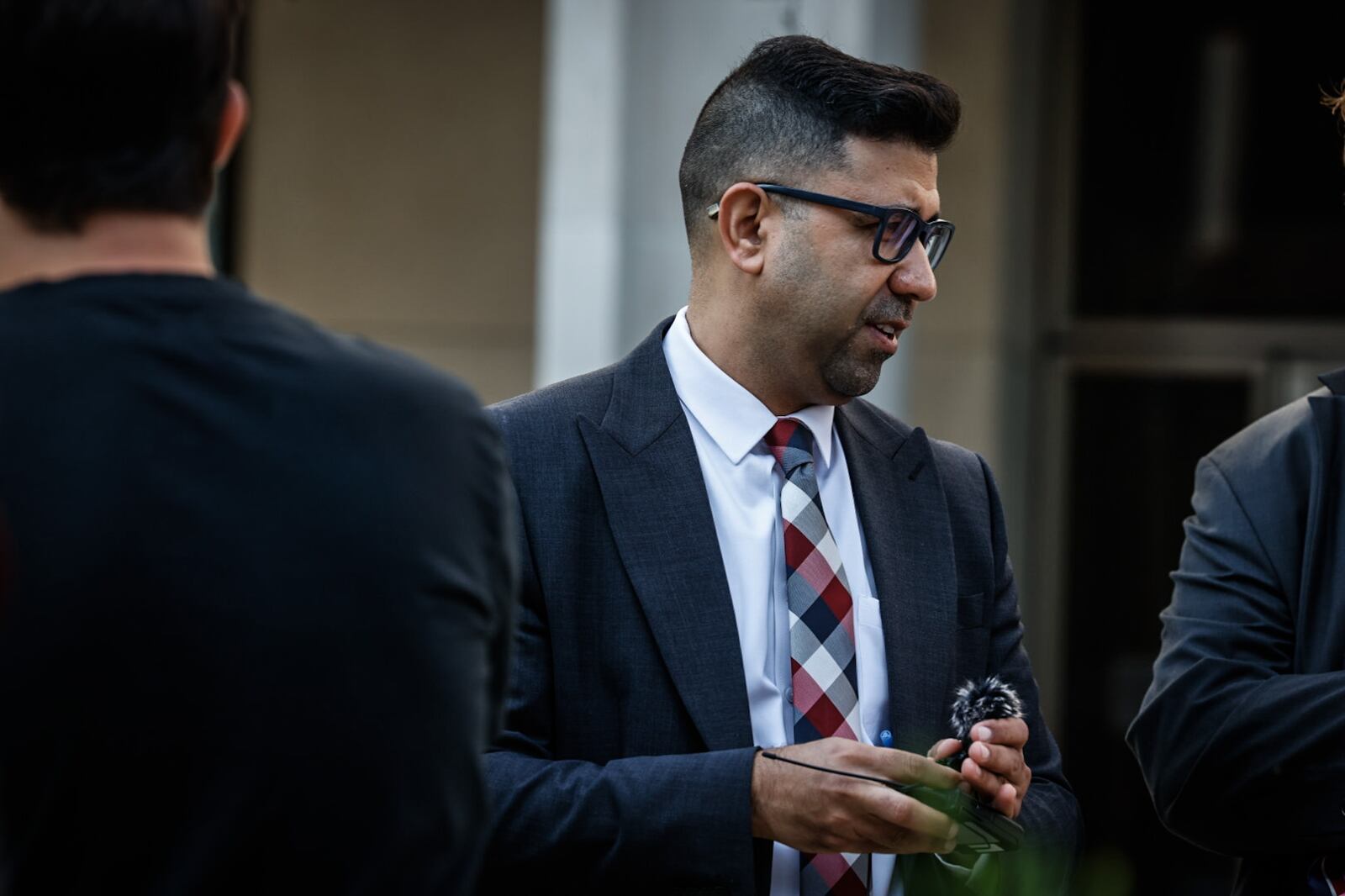 Montgomery County Democratic Party Chairman Mohamed Al-Hamdani held a press conference in front of the Montgomery County Pleas Court Monday, Aug. 19, 2024, ahead of the arraignment of Mike Foley and James Piergies. JIM NOELKER/STAFF