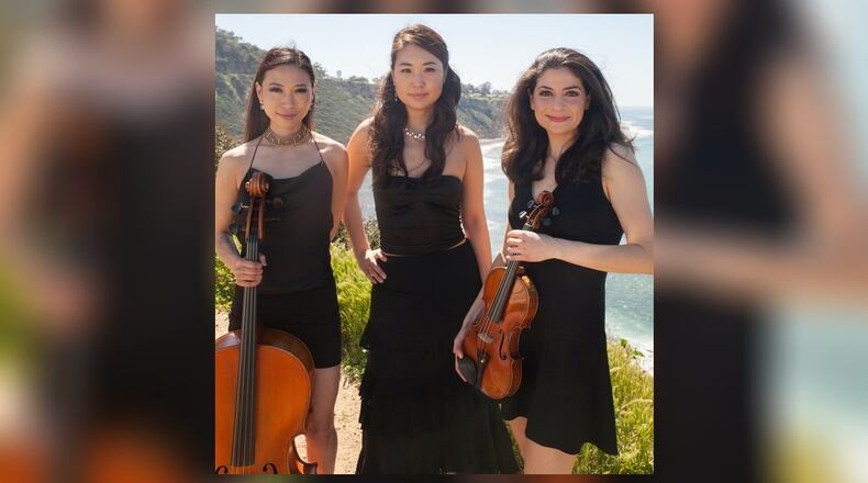 Take3, a trio of musicians who combine rock and classical, will perform at Urbana's Gloria Theatre on Saturday as part of the Stars on Stage series. CONTRIBUTED