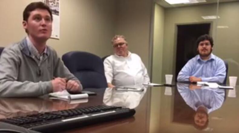 From left: University of Dayton student Danny Martin, 22; Jeff Porter, 61, of Centerville; and Thomas Caltabellotta, 23 and a Wright State University student discuss Trump’s first address to the joint Congress Tuesday Feb. 28, 2017.