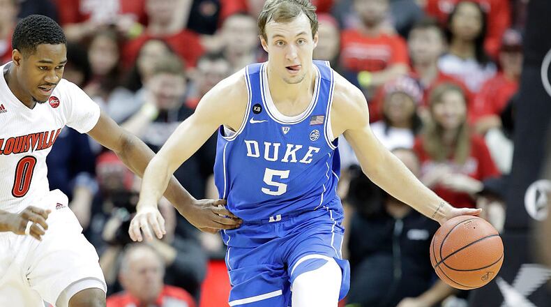LOUISVILLE, KY - JANUARY 14: Luke Kennard#5 of the Duke Blue Devils dribbles the ball during the game against the Louisville Cardinals at KFC YUM! Center on January 14, 2017 in Louisville, Kentucky. (Photo by Andy Lyons/Getty Images)