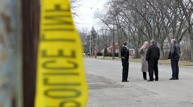 Dayton Police Chief Richard Biehl and other top brass revisited the shooting scene where an RTA bus driver was attacked and shot on Monday morning. DARRIN POPE / STAFF