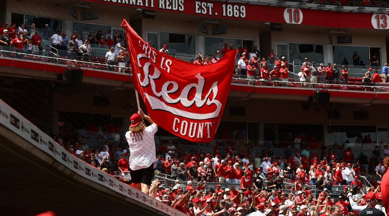 The Reds celebrate a victory against the Colorado Rockies on Wednesday, June 21, 2023, at Great American Ball Park in Cincinnati. David Jablonski/Staff
