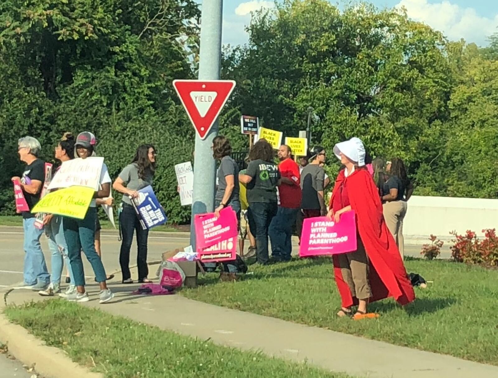 Protesters outside of the governor debate. Photo by Jeremy Ratliff