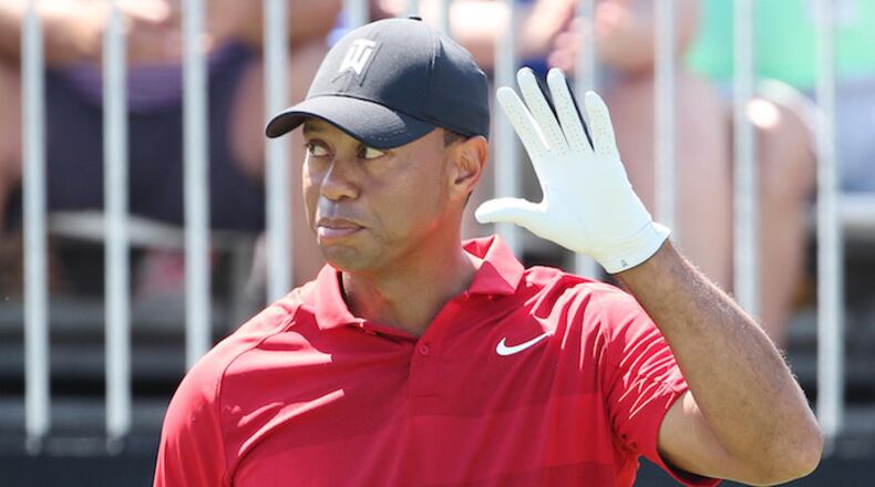 Tiger Woods acknowledges the cheering crowd before teeing off during the Arnold Palmer Invitational on March 18, 2018, at Bay Hill Club & Lodge in Orlando, Fla. (Stephen M. Dowell/Orlando Sentinel/TNS)
