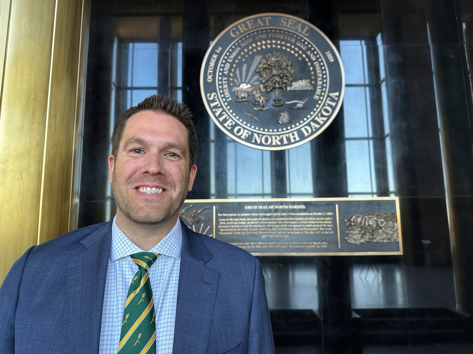 FILE -North Dakota Republican Secretary of State Michael Howe stands in Memorial Hall of the state Capitol in Bismarck, N.D., on Sept. 29, 2023. (AP Photo/Jack Dura, File)