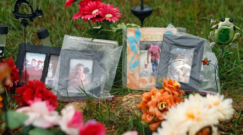 Gravesite of Frankie Rhoden who was killed along with seven other family members in rural Pike County The three locations where the murders took place remain uninhabited six months after the execution style killings on April 22, 2016. Investigators have released scant information and no clear motive has been revealed. TY GREENLEES / STAFF