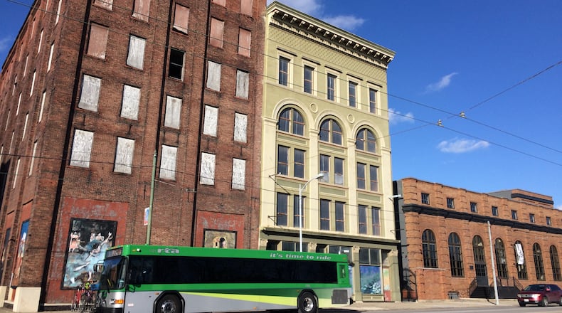 Woodard Development plans to buy the building at the corner, 601 E. Third St. Woodard already owns the building next door (607 E. Third St.) and helped transform the Steam Plant Dayton building at 617 E. Third St. CORNELIUS FROLIK / STAFF
