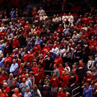 Dayton fans stand for the national anthem before a game against Fordham on Wednesday, Dec. 31, 2025, at UD Arena. David Jablonski/Staff