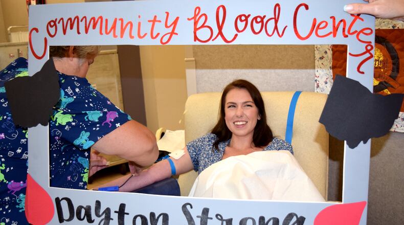 Katlin Becraft donates blood during a recent 'Dayton Strong' blood drive at Dayton Community Blood Center. CONTRIBUTED PHOTO