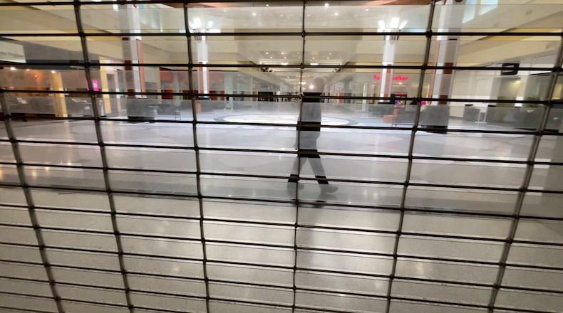 The interior of Northgate Mall in Colerain is seen from inside the former Seas store. Colerain Twp. took an more aggressive step in September 2023 when it partnered with the Port of Greater Cincinnati Development Authority to buy the former Sears store in a bankruptcy auction. RAY PFEFFER/WCPO