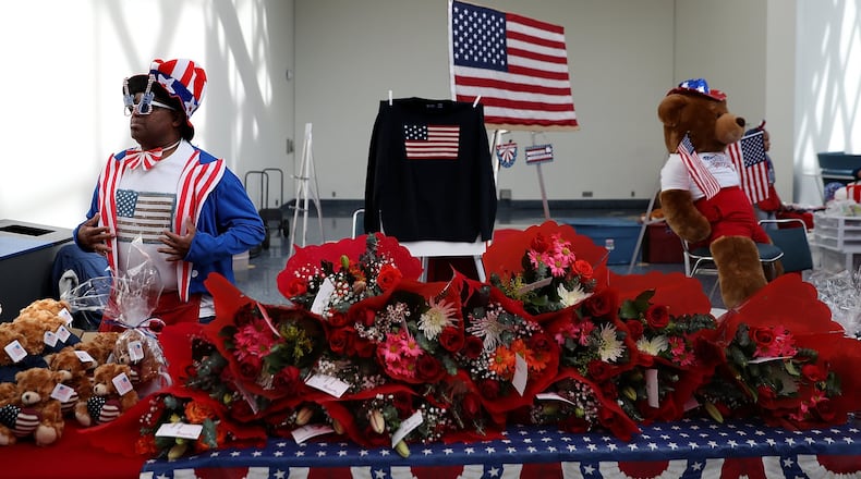 A vendor sells patriotic merchandise during a naturalization ceremony held by U.S. Citizenship and Immigration Services at the Los Angeles Convention Center on February 15, 2017 in Los Angeles, California. (Photo by Justin Sullivan/Getty Images)