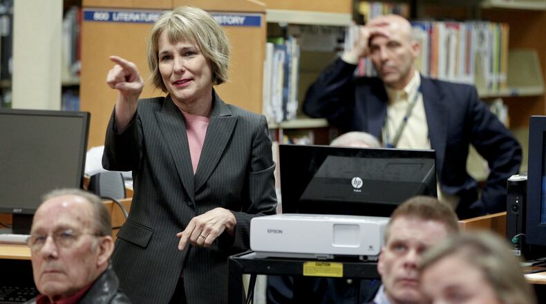Monroe Schools Treasurer Holly Cahall oversees two substitute levies for the district. Here she gives an overview of the school’s financial status at the community finance committee meeting at the school in Monroe, Ohio. FILE