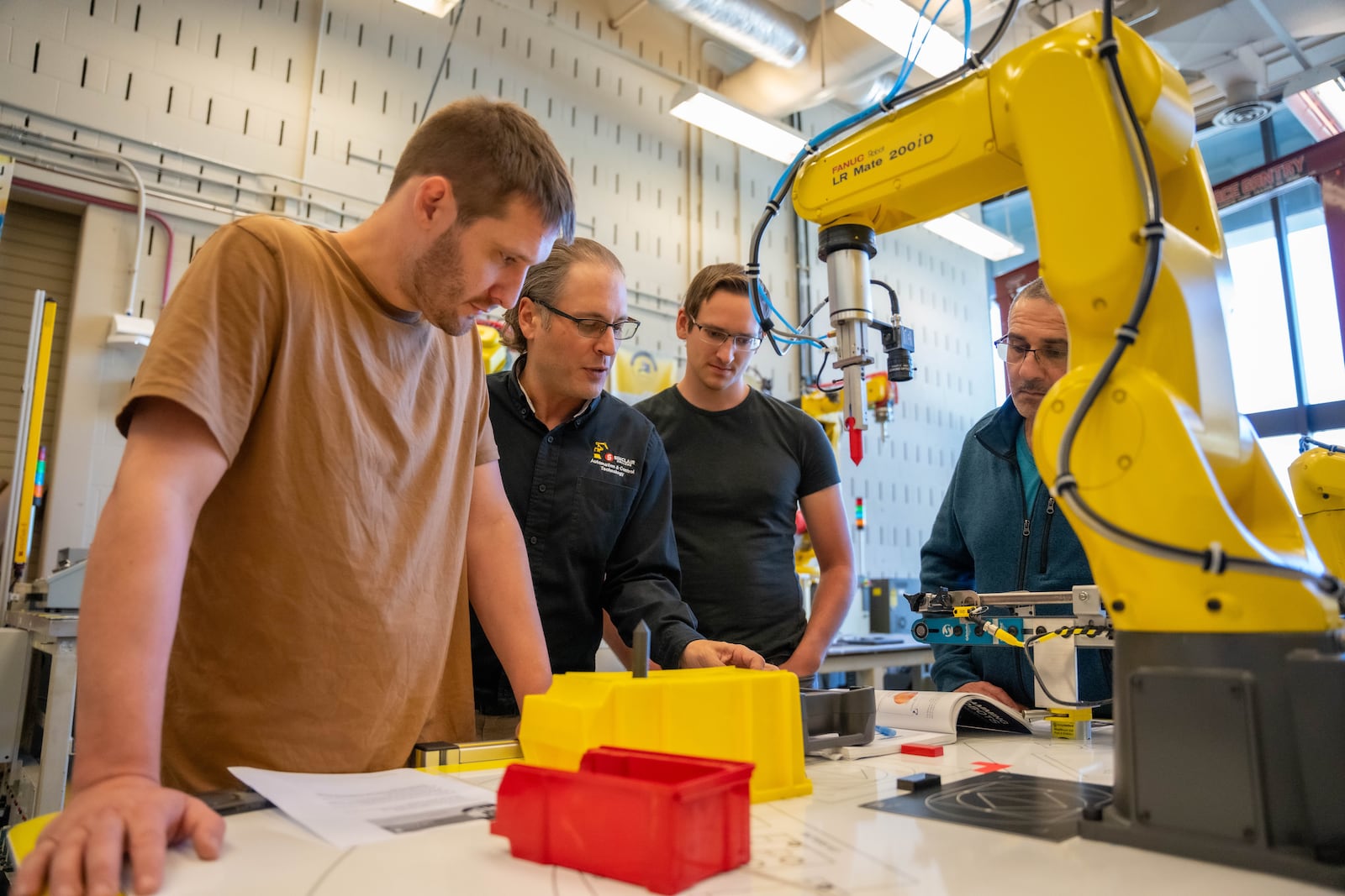 Sinclair Community College students work in a robotics/engineering class. Courtesy of Sinclair Community College.