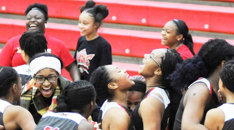 Trotwood-Madison players celebrate after a 37-35 girls high school basketball win at Tippecanoe on Thursday, Jan. 24, 2019. MARC PENDLETON / STAFF