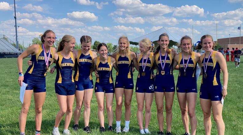 The Oakwood track team poses for a photo after winning the team championship at the Division II state track meet at Pickerington North High School on June 4 and 5, 2021. David Jablonski/Staff