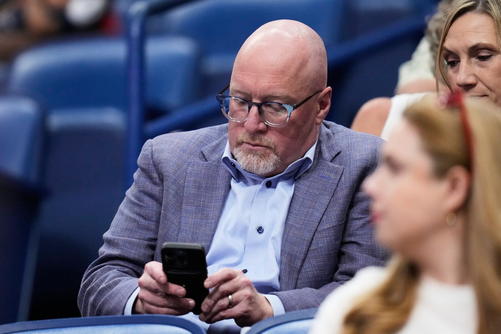 New Orleans Pelicans executive vice president of basketball operations David Griffin sits in the stands in the first half of an NBA basketball game against the Oklahoma City Thunder in New Orleans, Sunday, April 13, 2025. (AP Photo/Gerald Herbert)
