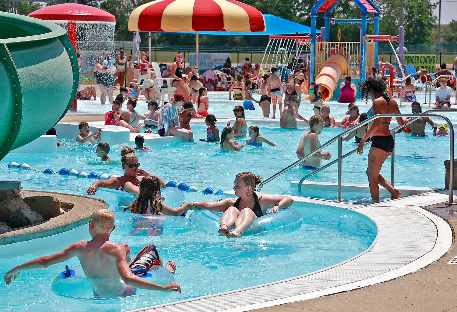 Splash Zone Aquatic Center on Eagle City Road was overflowing with swimmers looking for some relief from the 90 degree temperatures Friday, June 2, 2023. BILL LACKEY/STAFF