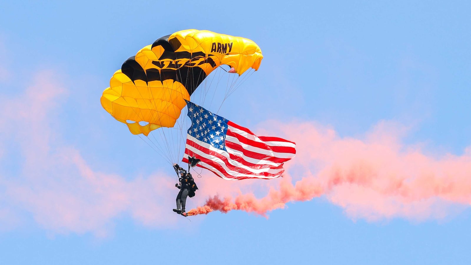 United States Army paratroopers were the first performers during the CenterPoint Energy Dayton Air Show on Sunday, June 22. BRYANT BILLING / STAFF