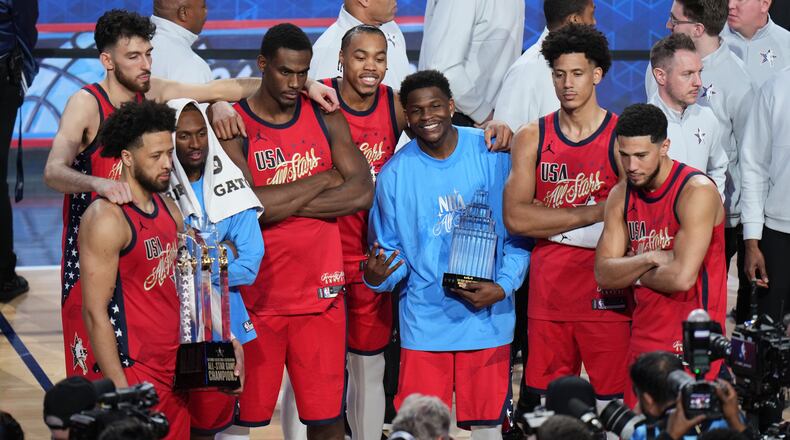 USA Stars pose for photos after a win over USA Stripes in the NBA All-Star basketball game Sunday, Feb. 15, 2026, in Inglewood, Calif. (AP Photo/Jae C. Hong)