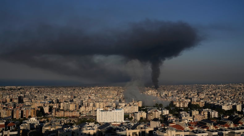 Smoke rises from Israeli airstrikes in Dahiyeh, a southern suburb of Beirut, Lebanon, Tuesday, March 3, 2026. (AP Photo/Hussein Malla)