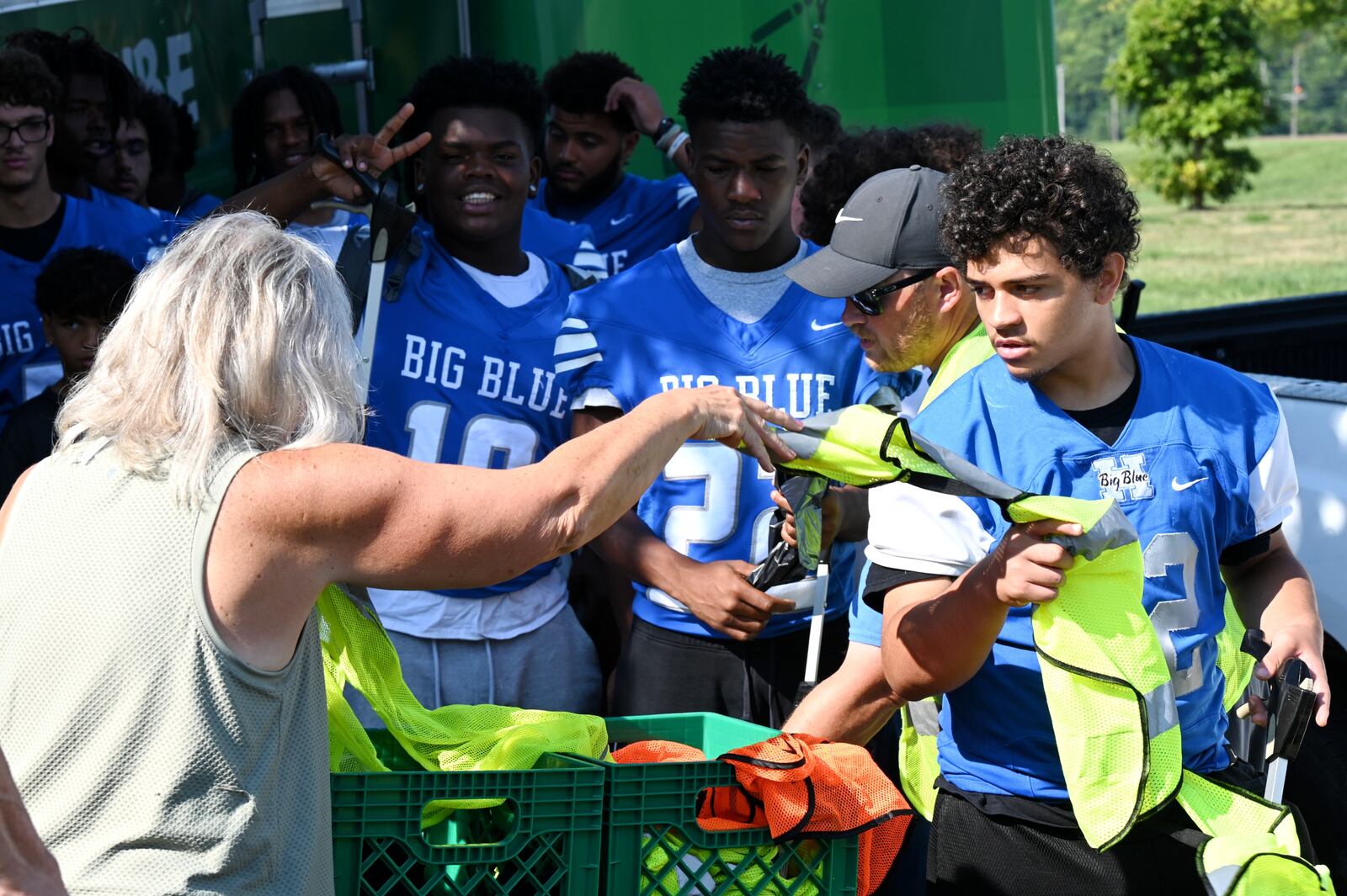 Hamilton and Badin play each other on Friday night, Aug. 22, 2025, in the season opener for Ohio high school football. However, the intercity athletic rivals teamed up on Saturday morning, Aug. 16, 2025, to help clean up part of their hometown, including the Booker T. Washington Center and Bailey Square. MICHAEL D. PITMAN/STAFF