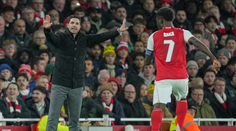 Arsenal's manager Mikel Arteta gestures from the touchline during the Champions League opening phase soccer match between Arsenal and Bayern Munich in London, Wednesday, Nov. 26, 2025. (AP Photo/Kin Cheung)