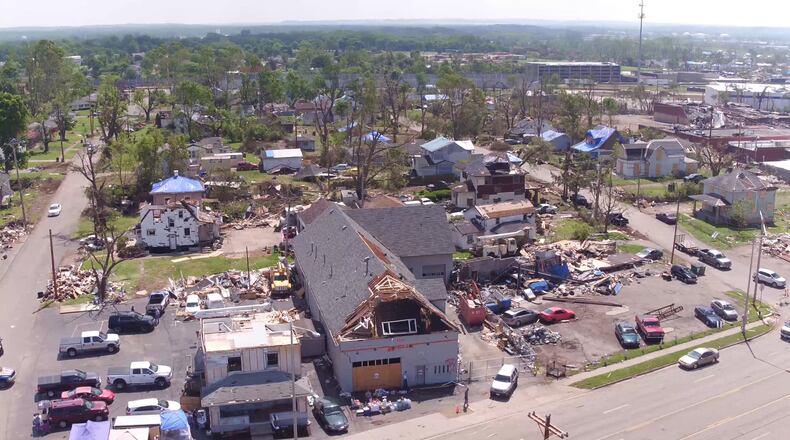 A part of Harrison Twp. along North Dixie Drive, with Wells Electric Service in the foreground, is pictured in 2019 just after the Memorial Day tornadoes. The the EF4 tornado that swept Montgomery County took away $20.7 million in taxable property value from Harrison Twp. TY GREENLEES / STAFF