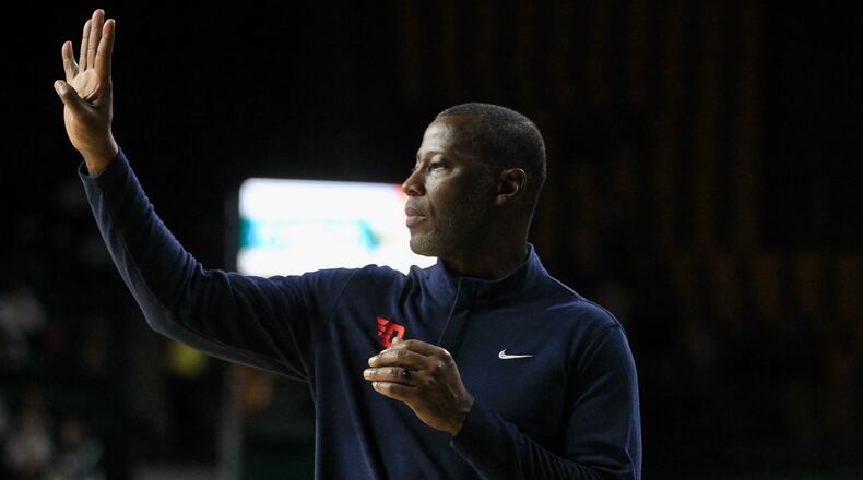 Dayton's Anthony Grant coaches during a game against George Mason on Saturday, Jan. 22, 2022, at EagleBank Arena in Fairfax, Va. David Jablonski/Staff