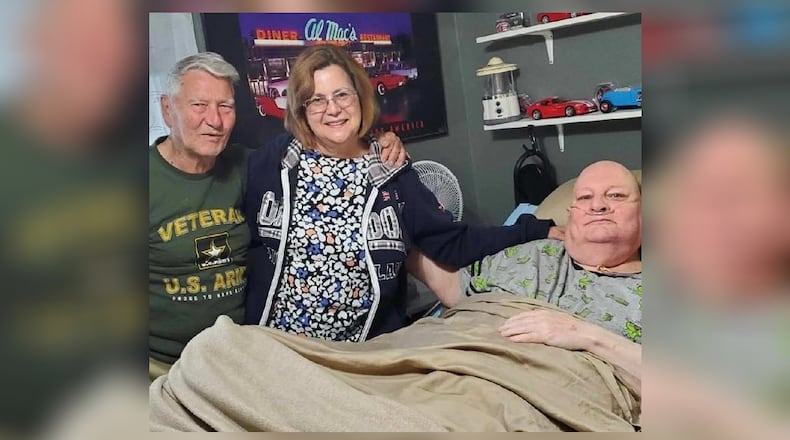 William Davis, 90, and his daughter, Sue Advey, meet William's 70-year-old half brother, Carl, of Miamisburg, for the first time Saturday, May 28, 2022. The two men may never have met if not for Advey's family tree search on genealogy site Ancestry.com. CONTRIBUTED