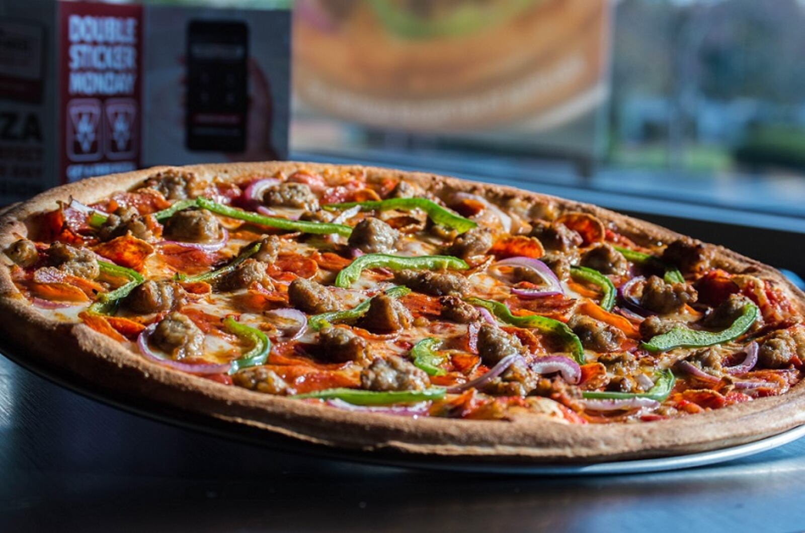 Rapid Fired Pizza is launching 14-inch family-sized pies in response to customer demand. CONTRIBUTED