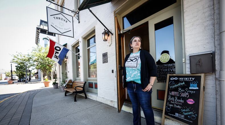 Bonnie Skinner founder of Infinity Soap Company specializes in handcrafted bath and body products at 4 North Main St. in Miamisburg. JIM NOELKER/STAFF