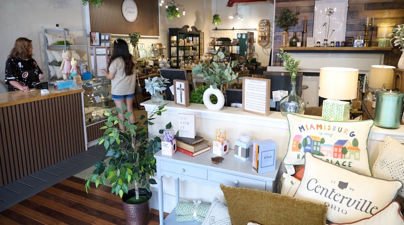 With Much Grace recently purchased M&Co in downtown Miamisburg and reopened the storefront as With Much Grace Boutique. BRYANT BILLING / STAFF