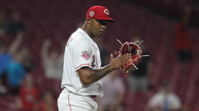 Reds reliever Raisel Iglesias claps after the final out of a victory against the Angels on Tuesday, Aug. 6, 2019, at Great American Ball Park in Cincinnati. David Jablonski/Staff