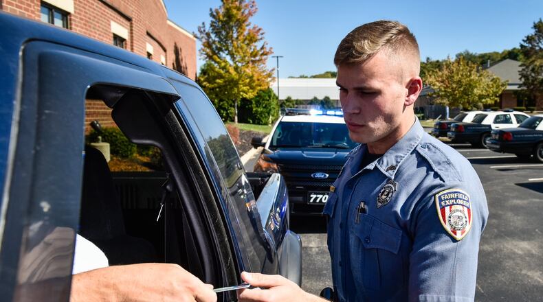 Cody Baker, who is part of the Fairfield Police Department’s Explorer program, practices a traffic stop at the Fairfield Police Department. The Fairfield Explorers is a cadet program for students ages 14-21 to learn about what it is like to be a police officer. NICK GRAHAM/STAFF